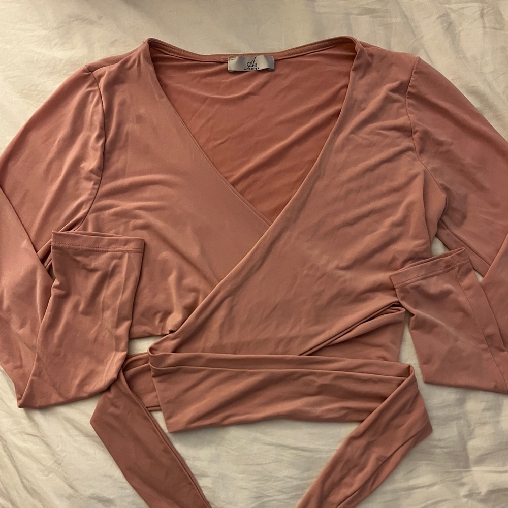 Long Sleeve Solid Criss Cross Tie Waist Top.